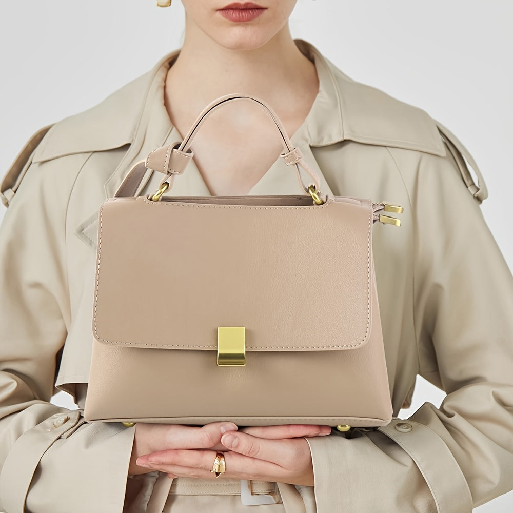 Bag held by the top handle to show scale