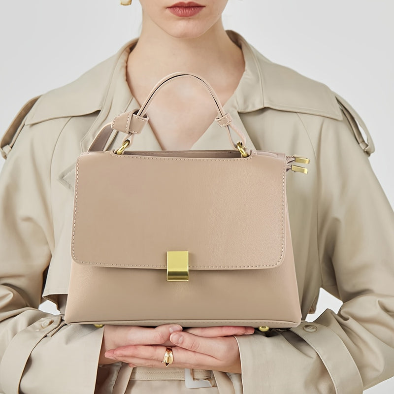 Bag held by the top handle to show scale