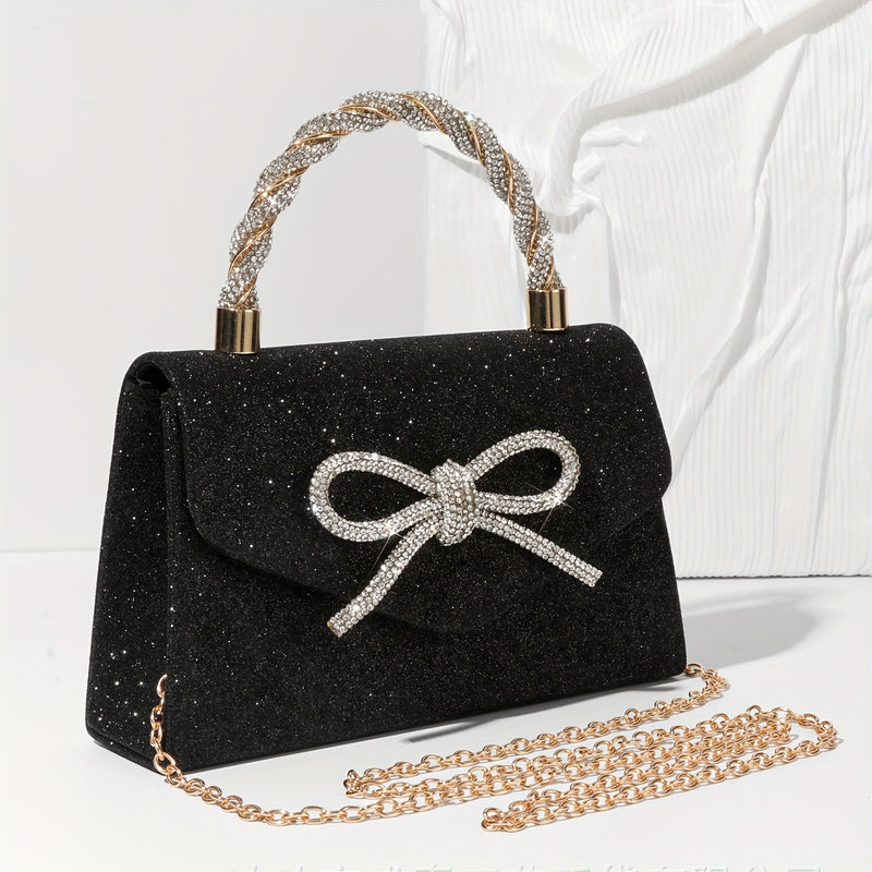 Black glitter evening clutch with rhinestone bow and chain strap