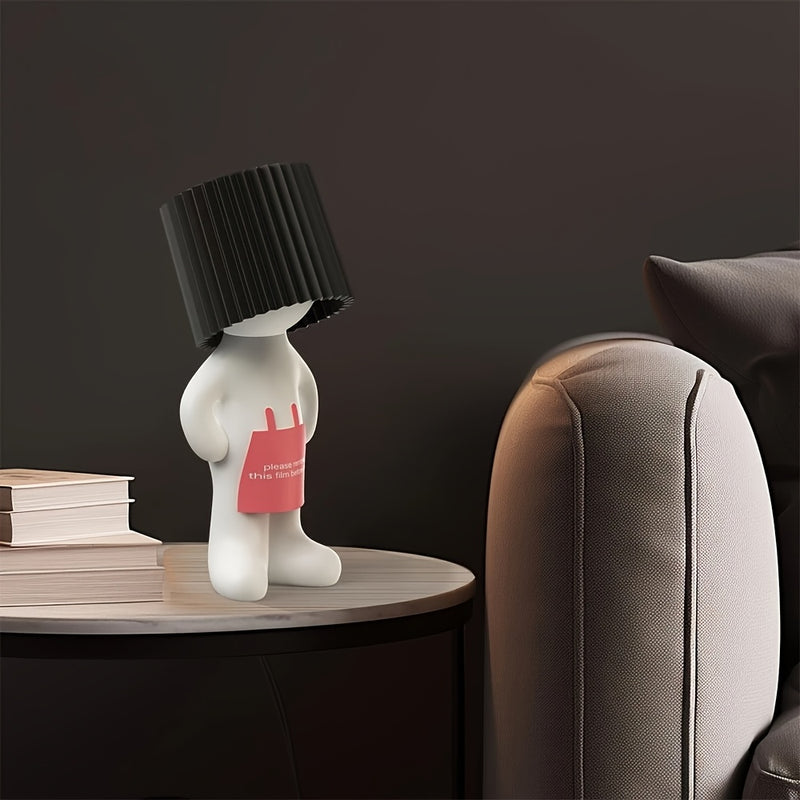 Lamp on a side table beside a sofa