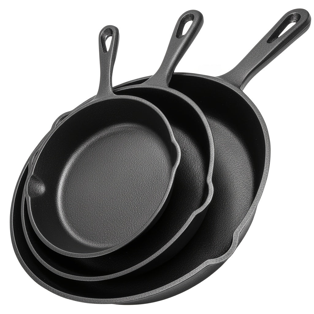 Three-piece cast iron skillet set in graduating sizes with drip spouts