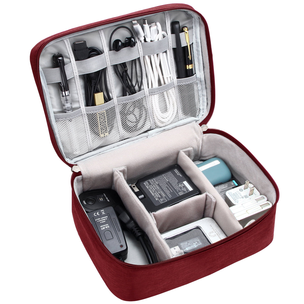 Red travel electronics organizer open and packed with cables and accessories