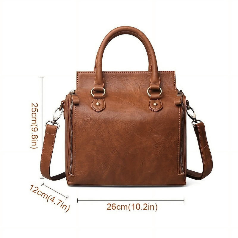 The bag closed, front view, with measurements marked 26 cm wide, 25 cm tall and 12 cm deep