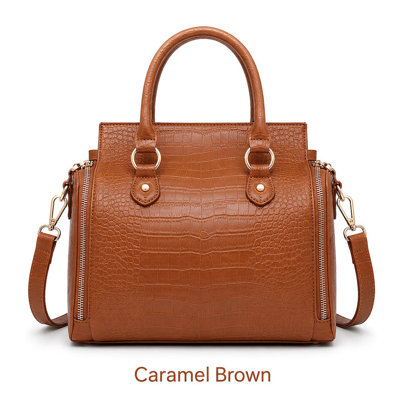 The bag in Caramel Brown, front view with the crossbody strap attached