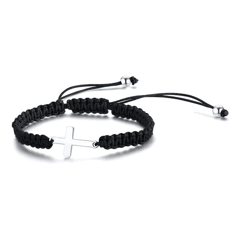 Full bracelet on white showing the cord, cross and drawstring