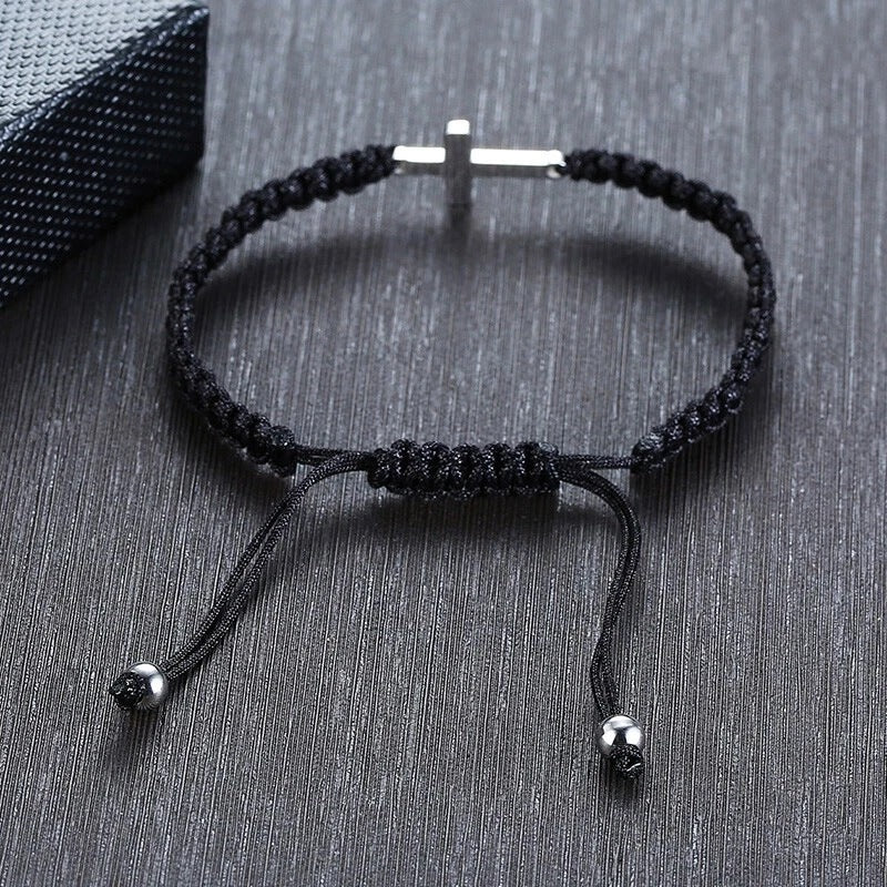 Bracelet laid flat in a circle on dark wood