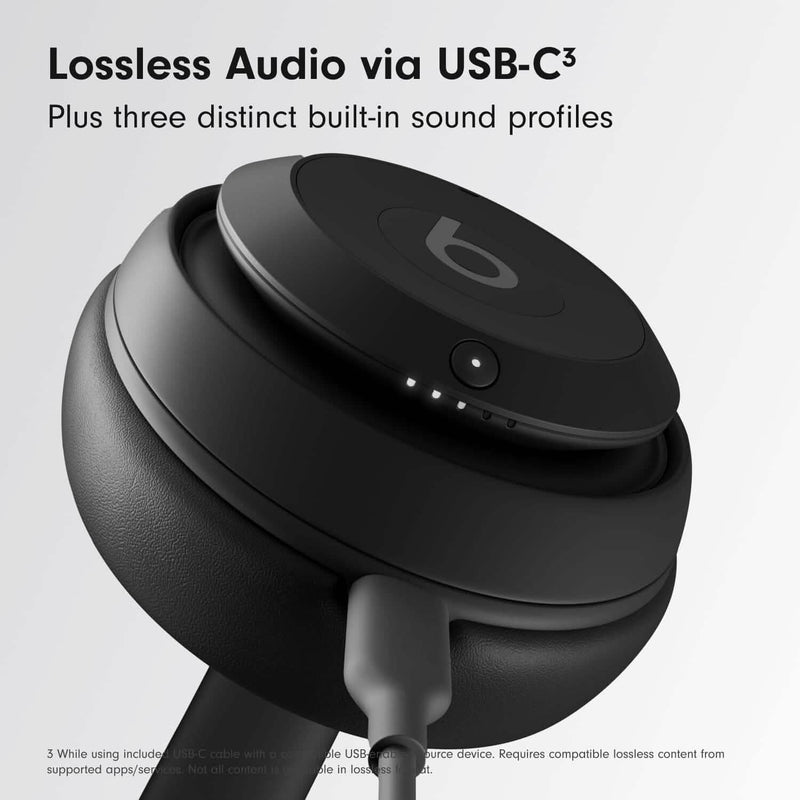 Side view of a pair of black Beats Studio Pro Wireless Bluetooth Noise Cancelling Headphones illustrating its active noise cancelling feature