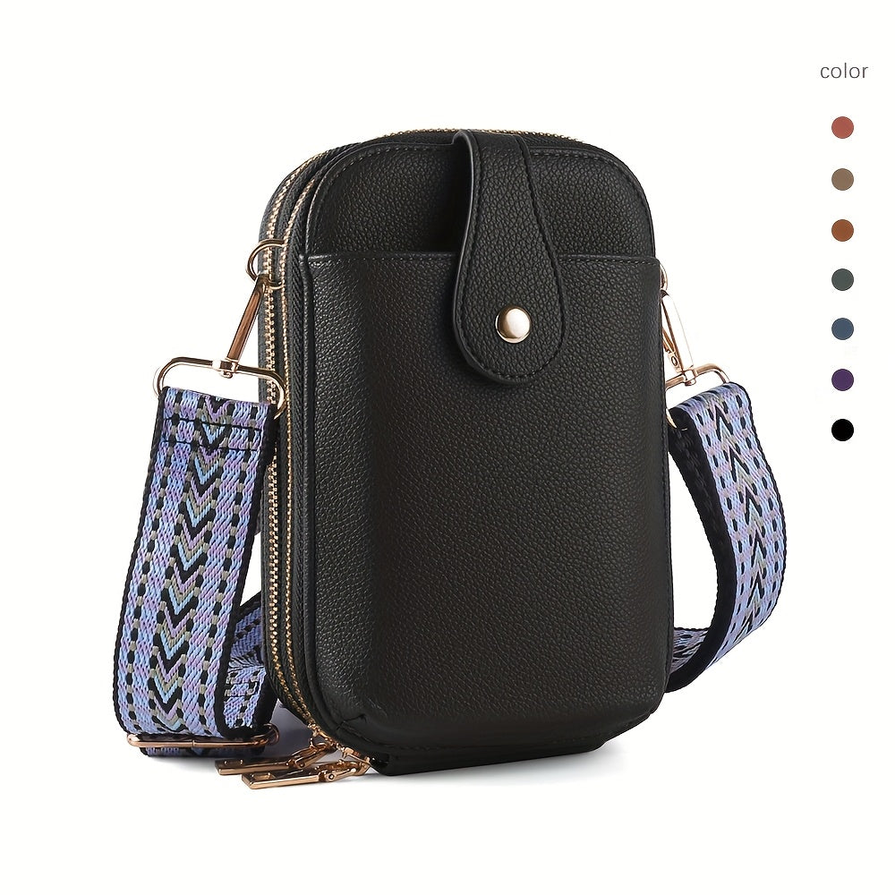 Black phone crossbody bag with wide patterned strap