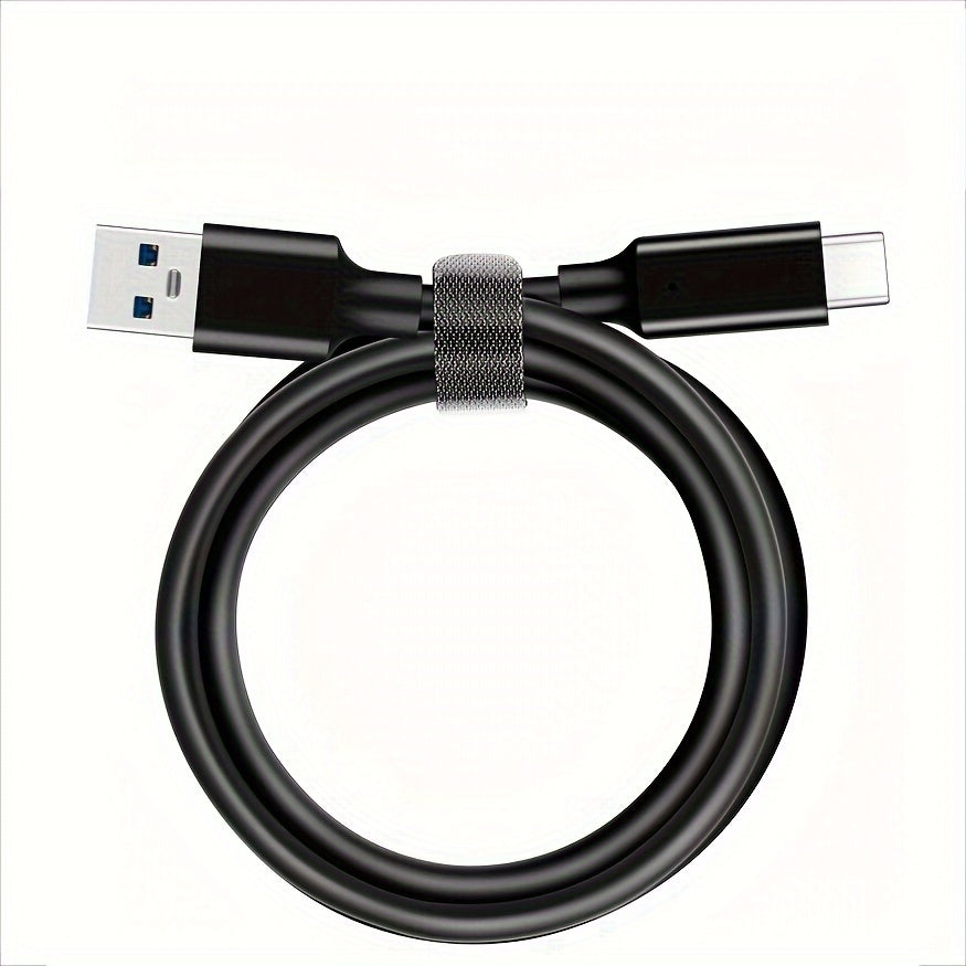 USB-A to USB-C cable coiled with a cable tie