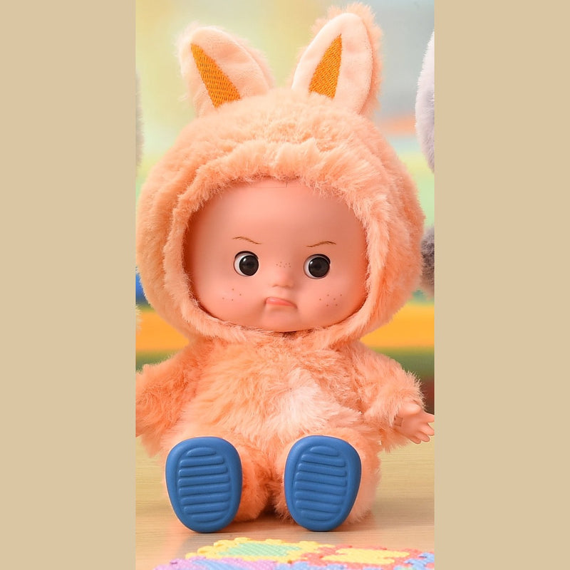 Orange plush onesie doll with eyes open, seated