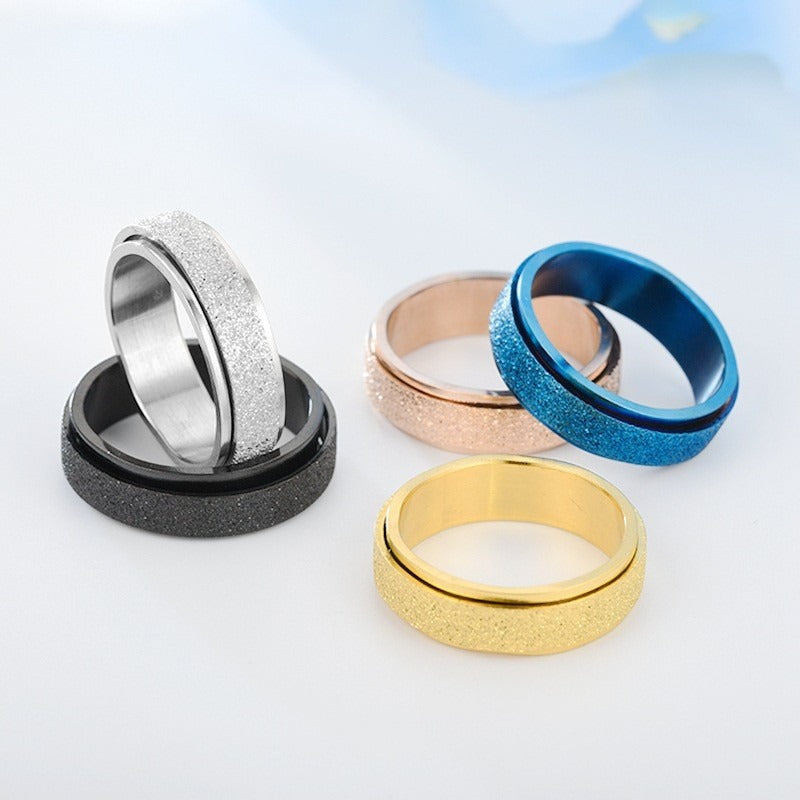 Several rings shown loose to display the spinning outer band
