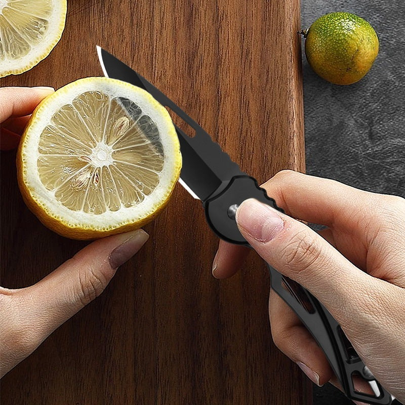 Pocket knife slicing a lemon