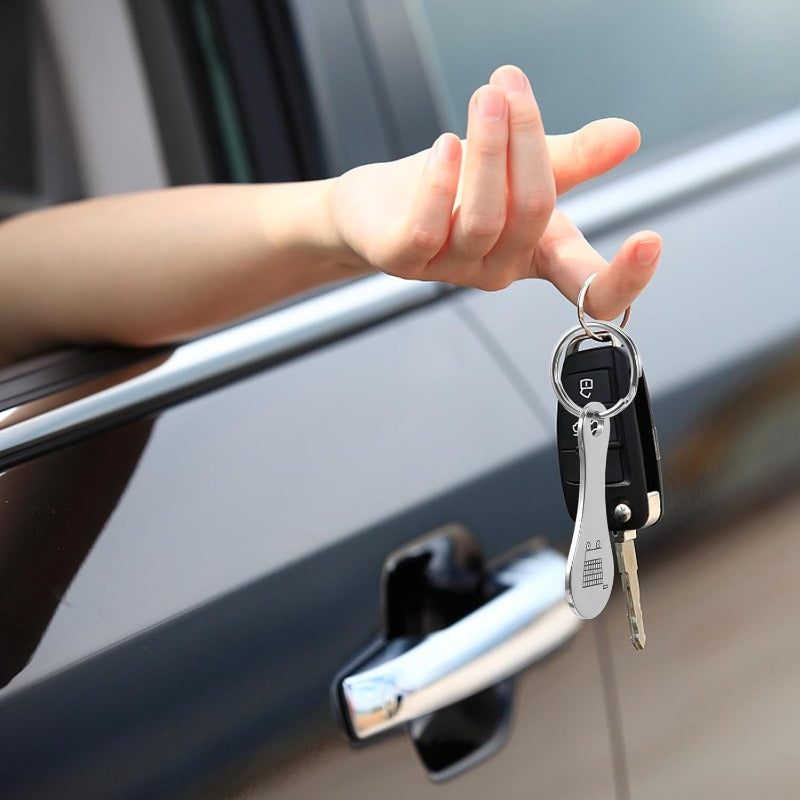 Shopping cart token keychain on keys at a car door