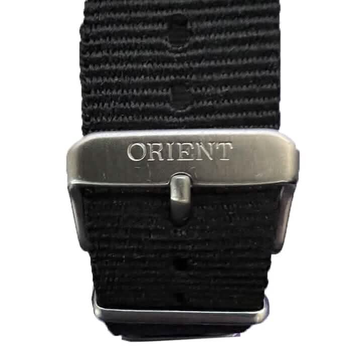 Closeup of band buckle of phosphorescent ORIENT VR32-UAB0 Men's Quartz-Chronograph with Date