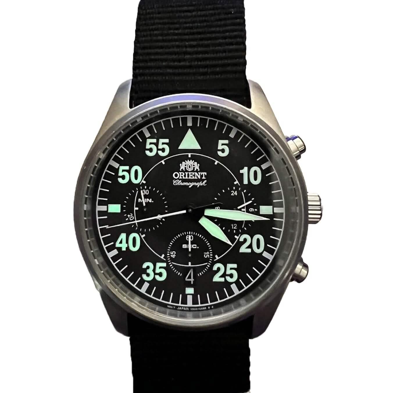 Closeup of ORIENT VR32-UAB0 Men's Quartz-Chronograph with Date (Refurbished) with phosphorescent numbers