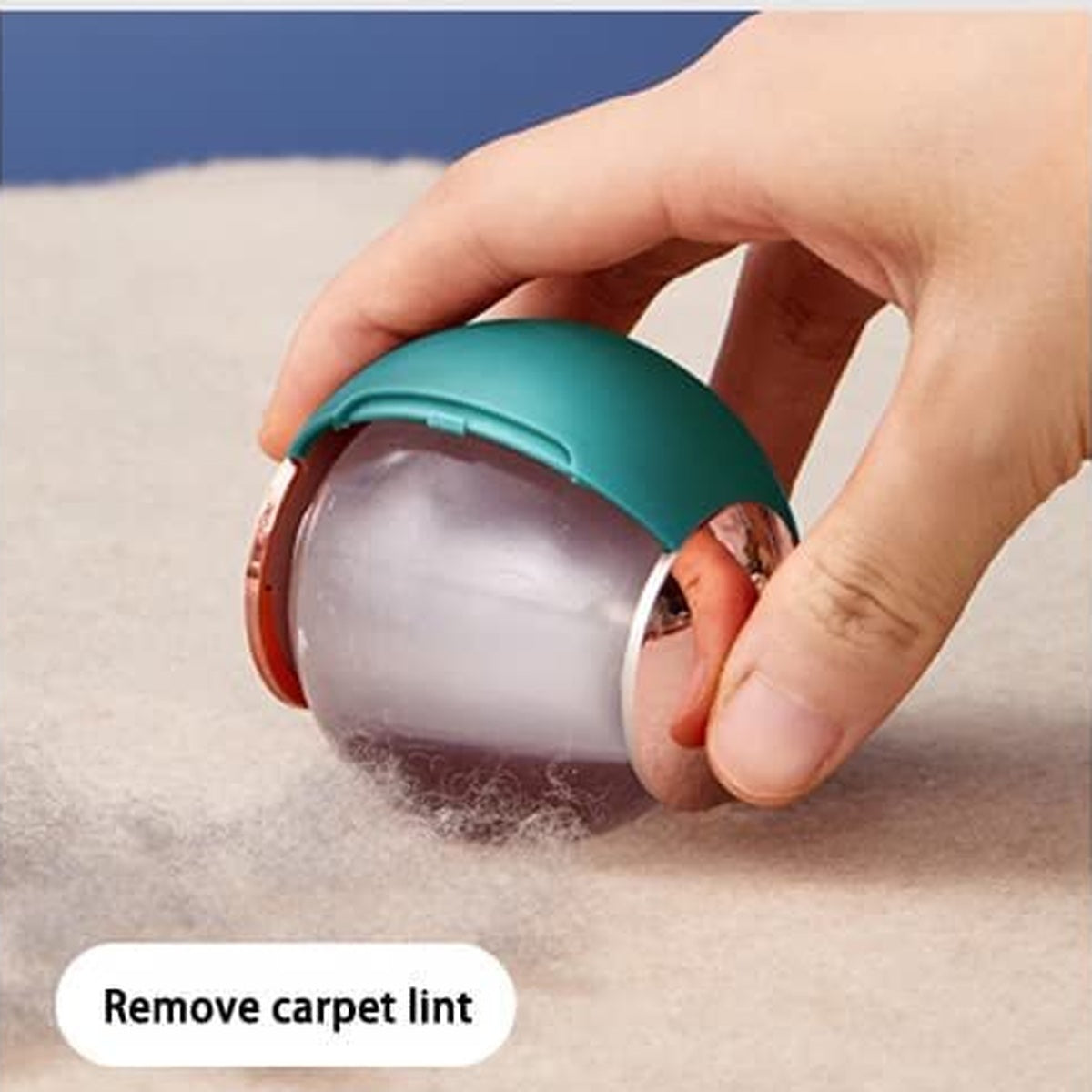 Hand rolling the gel lint remover ball over a carpet to lift lint