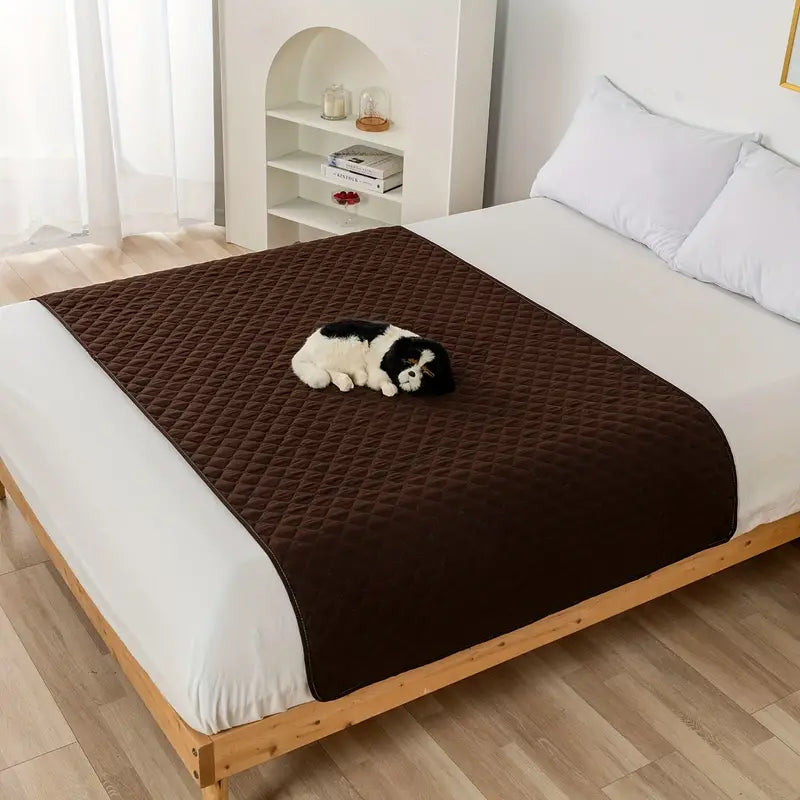 Waterproof Pet Bed Cover for Furniture in brown, laid down over a queen size bed