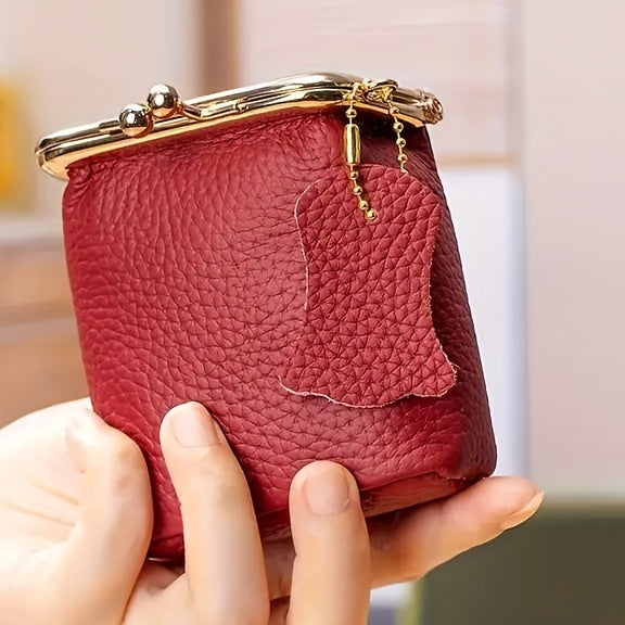 Deep red pebbled leather kiss lock coin purse