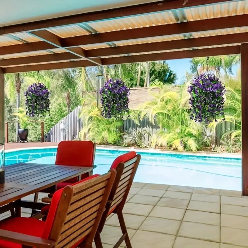 Vines hanging over a poolside dining area