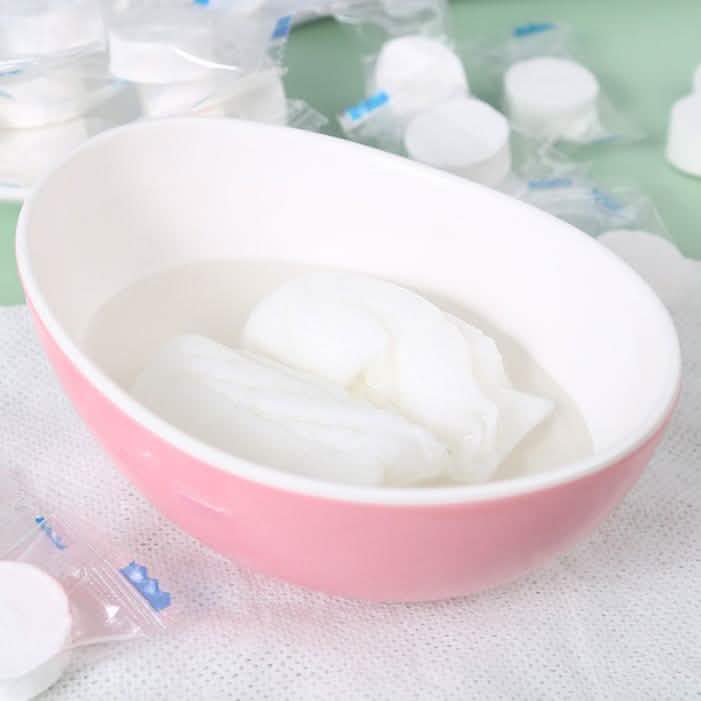 100-Pack: Mini Compressed Towels Bags & Travel - DailySale