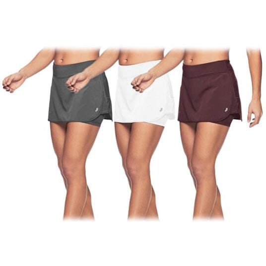 Closeup of three women wearing Penn Women's Active Athletic Performance Skorts in assorted colors