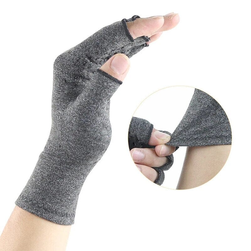 Hand wearing a Rheumatoid Arthritis Magnetic Compression Glove with an inset of a hand pulling on the sleeve of a tshirt
