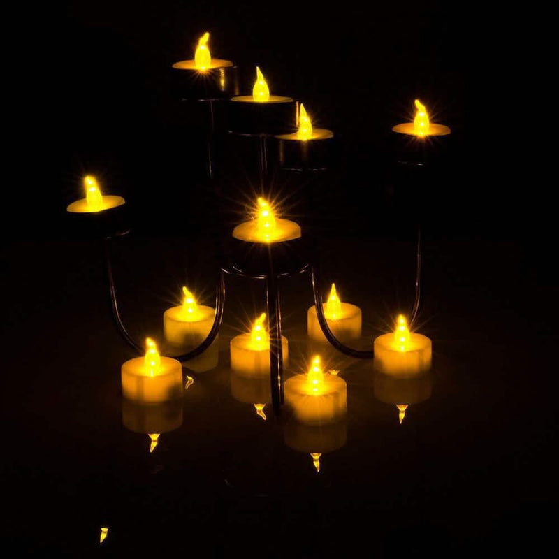 24-Piece: LED Flameless Tealight Smokeless Flickering Candles Indoor Lighting - DailySale