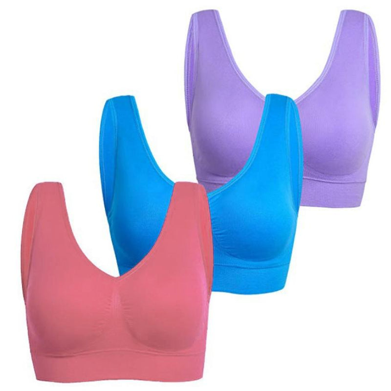 Pink, purple, and blue bras placed side be side from the 3-Pack: Seamless Miracle Bras with Removable Pads - Assorted Color Sets