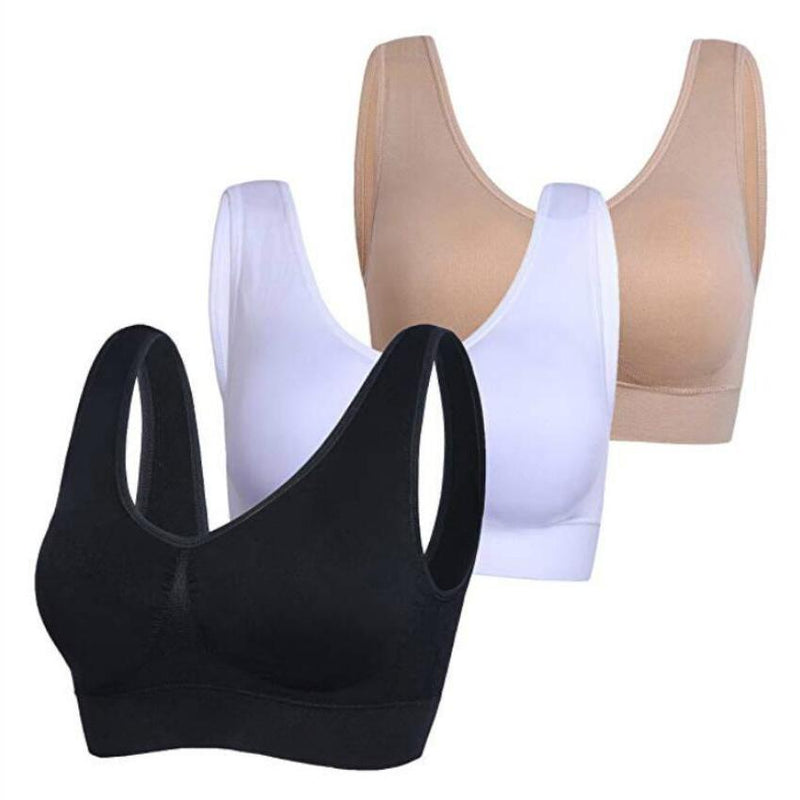 Black, white, and beige bras placed side be side from the 3-Pack: Seamless Miracle Bras with Removable Pads - Assorted Color Sets