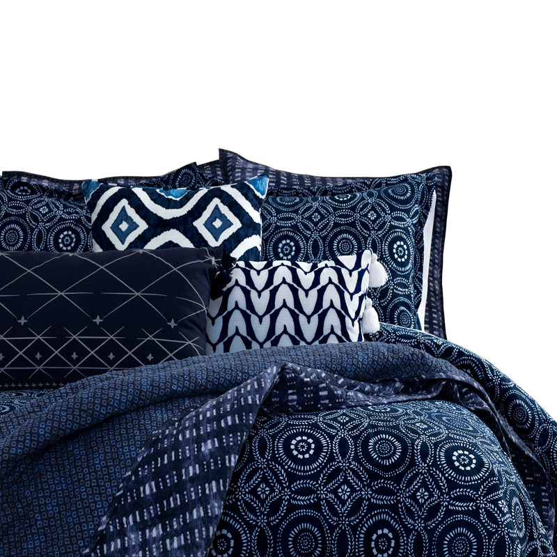 Front view of 3-Piece: Global Indigo Mudcloth Cotton Quilt Set placed on a queen-size bed