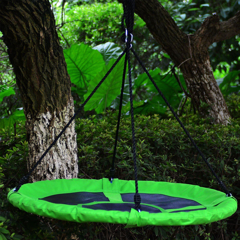 Hanging 40" Flying Saucer Tree Swing Chair Kids Round Hanging Rope Seat in green hanging from a tree