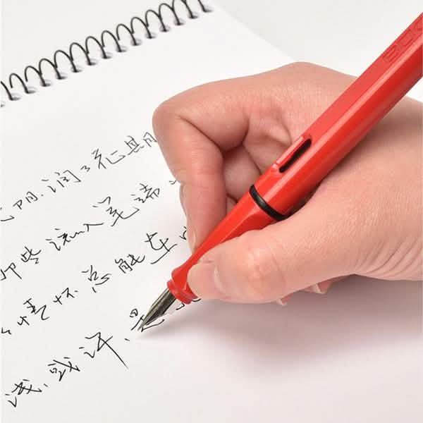 Example of woman writing caligraphy with a pen from the 5-Pack Fashion Color Student Office Fountain Pens