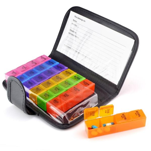 7 Day Extra Large Pill Organizer with Cute Travel Case displayed with case open with orange pill organizer shown outside the case