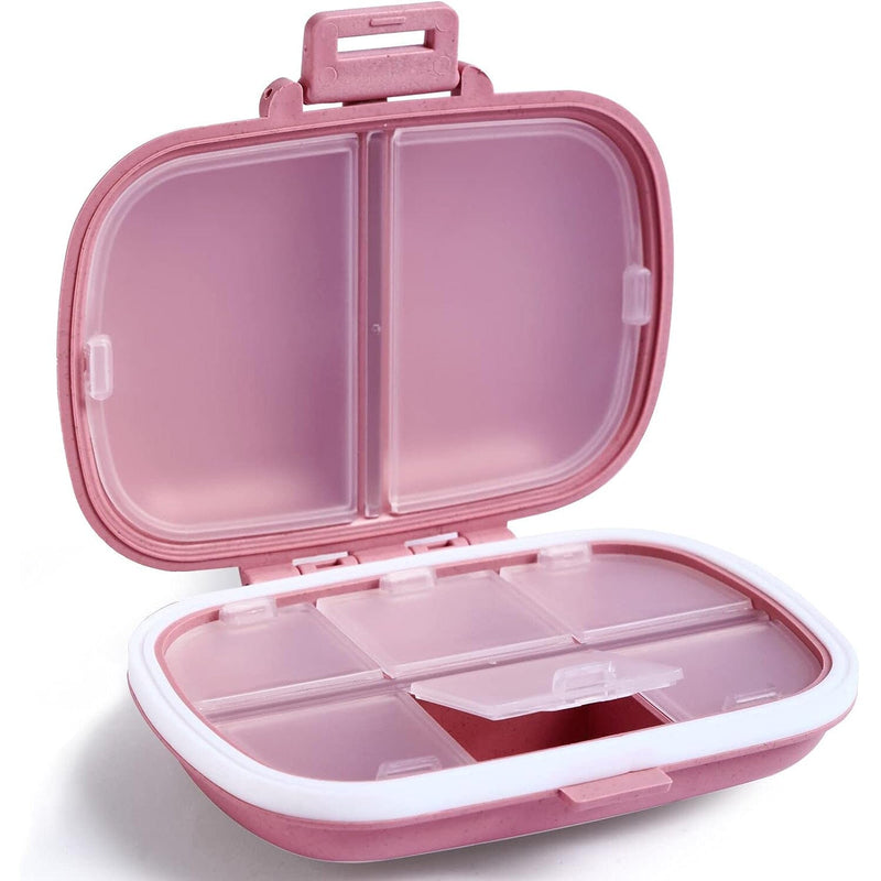 8-Compartment Travel Pill Organizer shown in pink, available at Dailysale