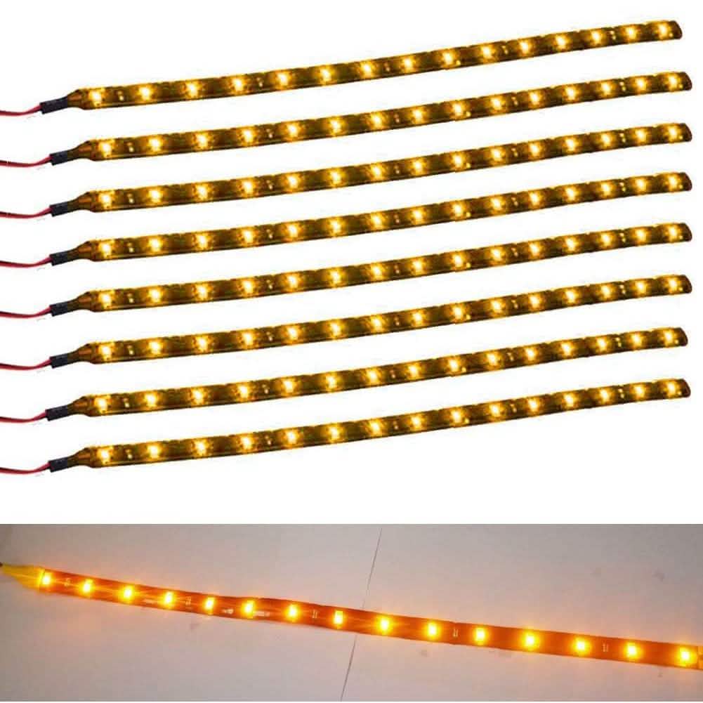 8-Piece Flexible Waterproof yellow LED Strip Light for Car laid out on a white surface