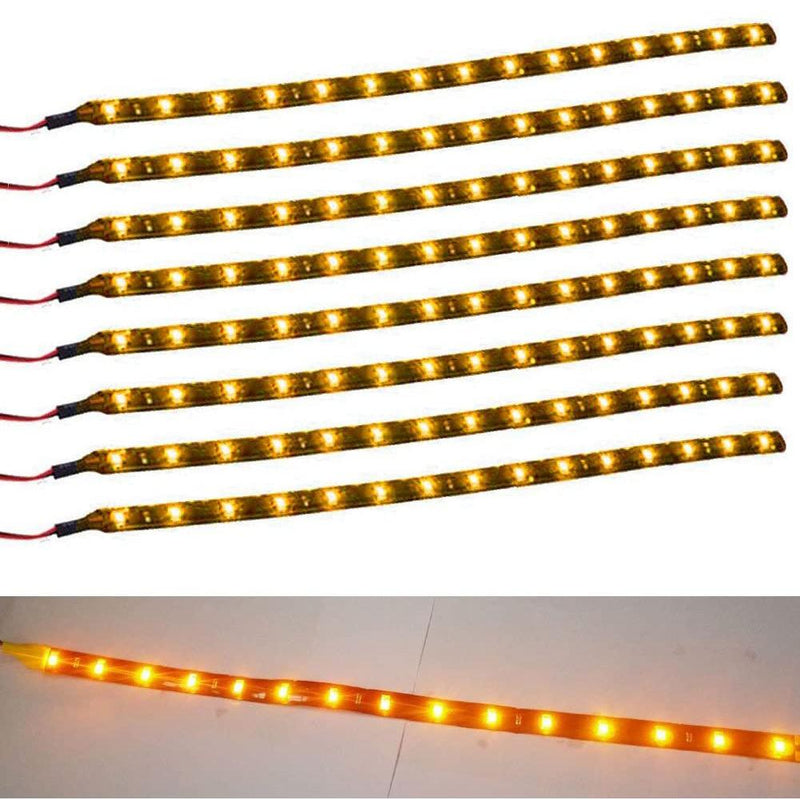 8-Piece Flexible Waterproof yellow LED Strip Light for Car laid out on a white surface