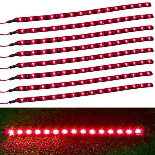 8-Piece Flexible Waterproof red LED Strip Light for Car laid out on a white surface