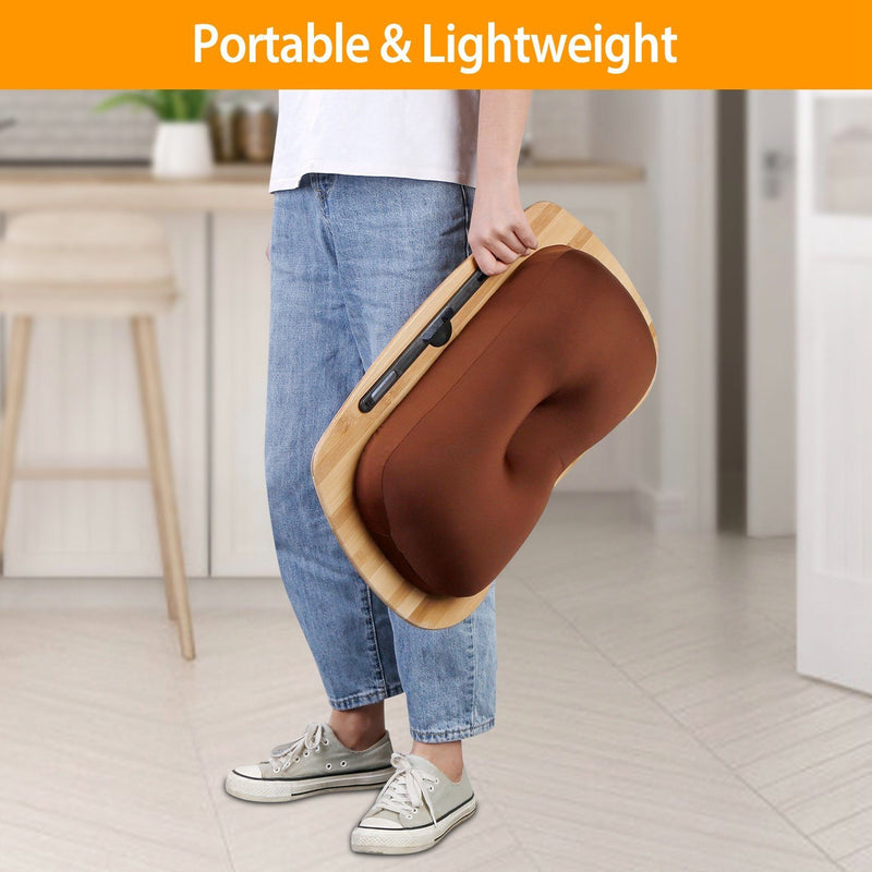 Man holding a Bamboo Laptop Lap Desk with Pillow Cushion Stand Holder Table standing in the middle of a kitchen