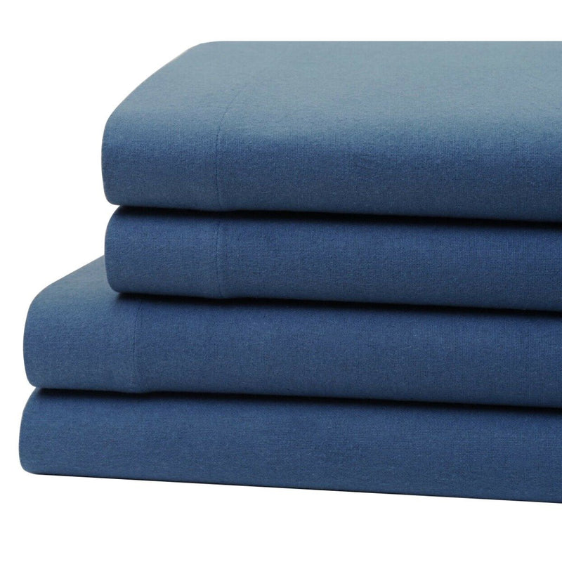 Bibb Home 100% Cotton Solid Flannel Sheet Set on display on a bed in blue