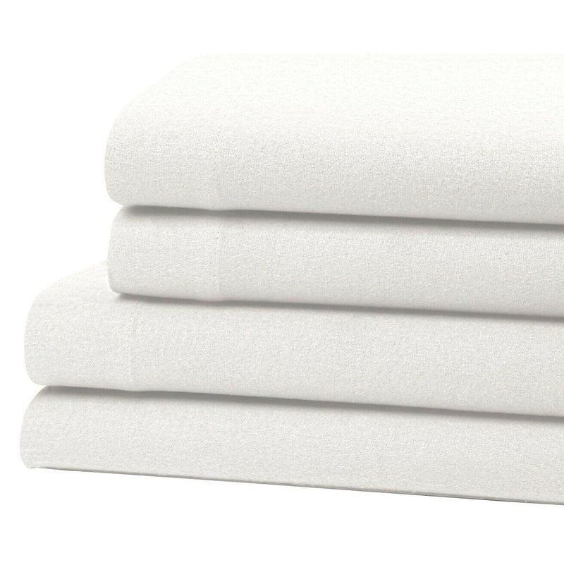 Bibb Home 100% Cotton Solid Flannel Sheet Set on display on a bed in white
