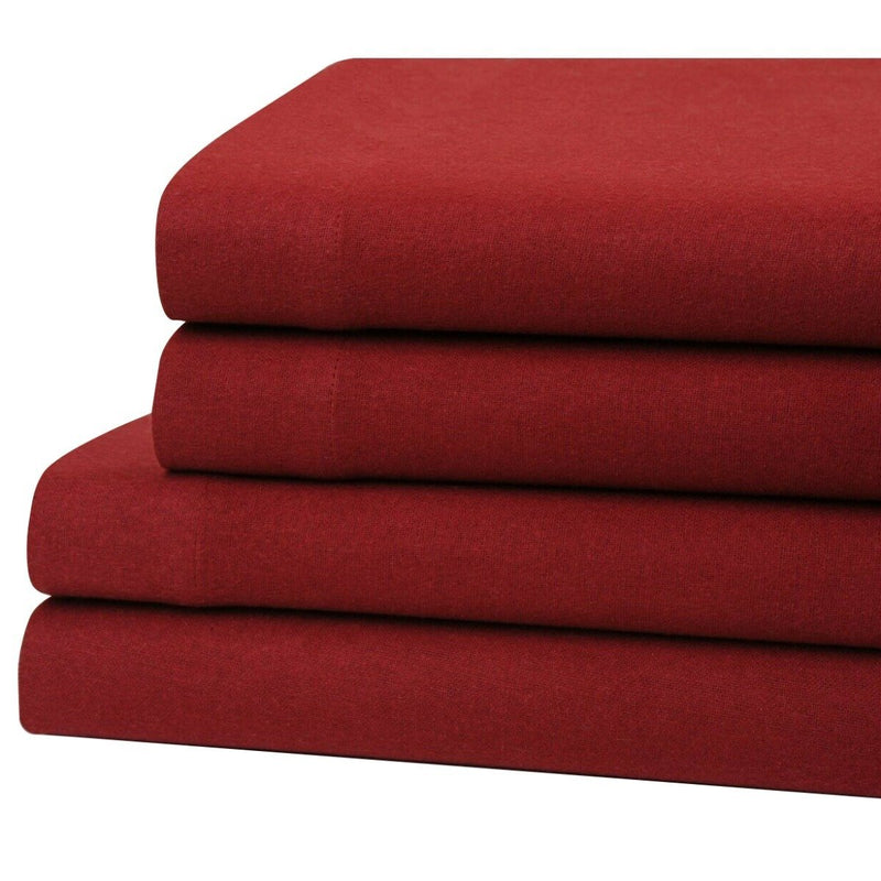 Bibb Home 100% Cotton Solid Flannel Sheet Set on display on a bed in wine