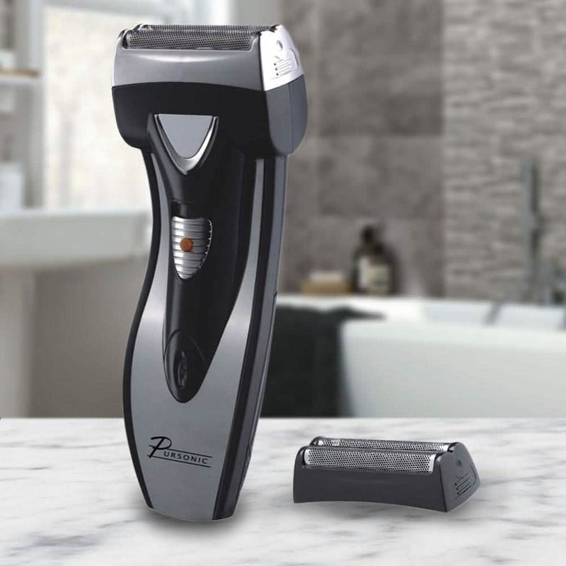 BSF200 Battery Operated Shaver With Pop Up Trimmer with Includes Extra Foil standing on a bathroom marble counter
