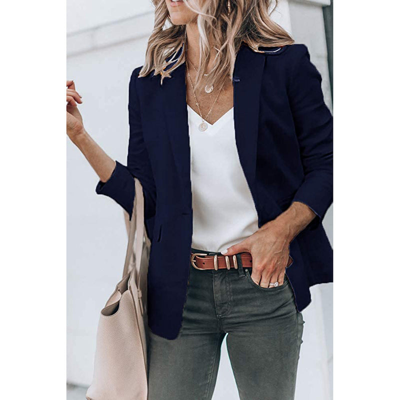 Woman with a hand in her jeans' pocket wearing a Cicy Bell Womens Casual Blazer, shown in navy