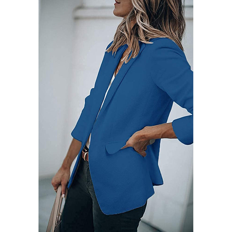 Woman standing on her side with a hand in the pocket wearing a Cicy Bell Womens Casual Blazer, shown in royal blue