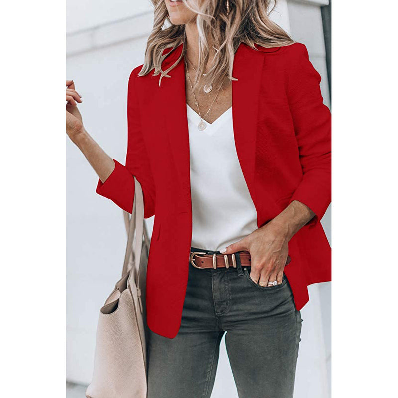 Woman with a hand in her jeans' pocket wearing a Cicy Bell Womens Casual Blazer, shown in red