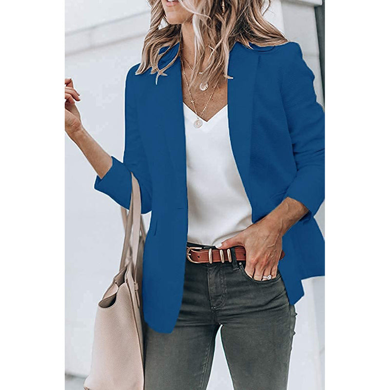 Woman with a hand in her jeans' pocket wearing a Cicy Bell Womens Casual Blazer, shown in royal blue