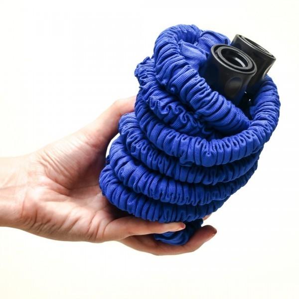 Hand shown holding an Expandable Collapsible Garden Hose