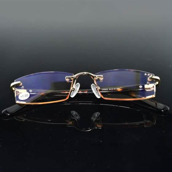 Luxury Men Diamond Glasses resting on a reflecting table in +1.0 prescription
