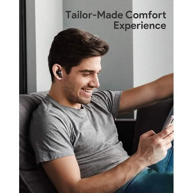 Sitting smiling man listening to music using LY-E1 True Wireless Earbuds