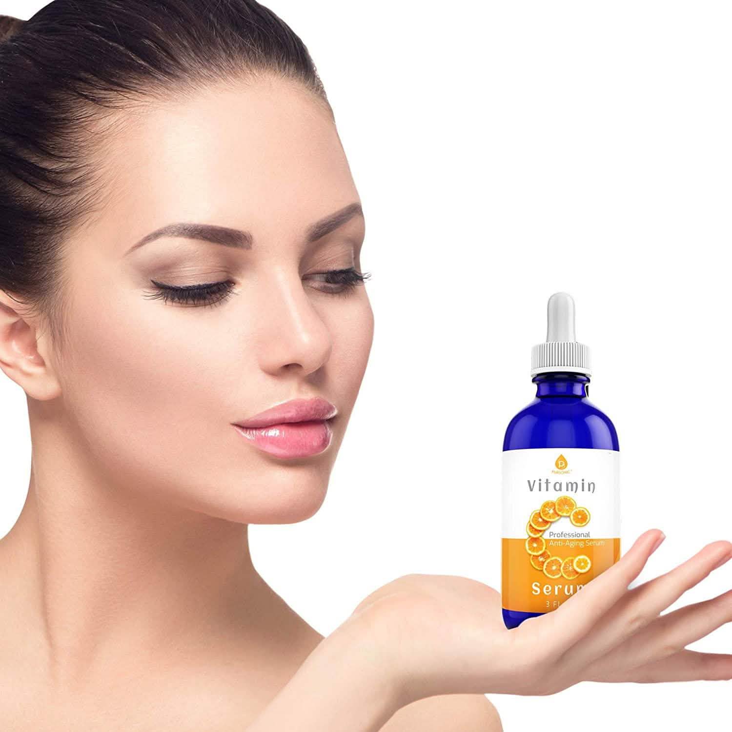 Woman holding a bottle of Pursonic Vitamin C Best Organic Anti-Aging Moisturizer Serum in her hand